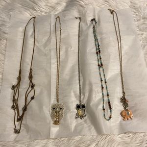 5 long neckless one elephant two owls and other two are beads  and flower